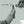 Load image into Gallery viewer, A close-up of the main design shows a photograph of a male hand holding a spark plug. The photograph also shows the correct measurement for a spark plug gap.