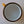 Load image into Gallery viewer, An overhead view of Fault Line's yellow enamel mug. The lip of the mug is black, the inside is white.
