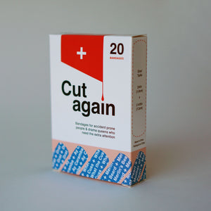 A box of bandaids designed by Cut Again