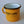 Load image into Gallery viewer, A three-quarter view of Fault Line&#39;s yellow enamel mug. The mug has a black lip. The front of the mug has a black Fault line logo on it.
